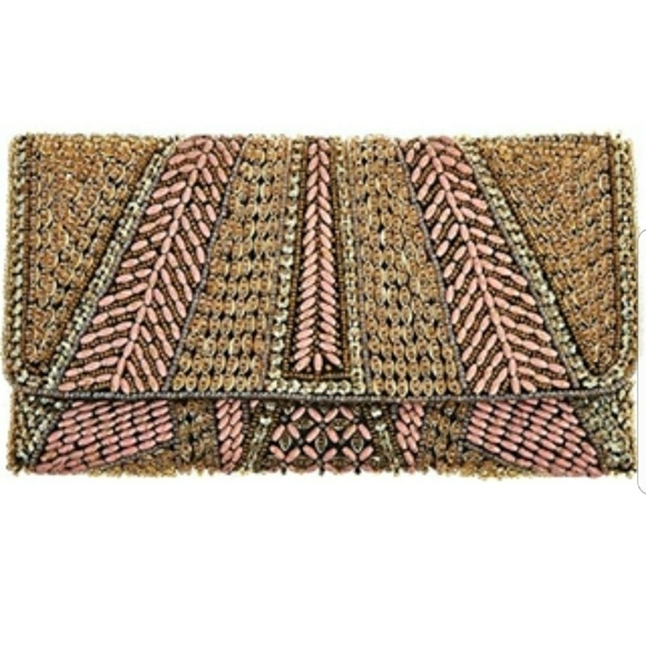From St. Xavier Handbags - From St. Xavier arch clutch